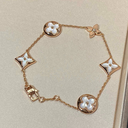 [Charm Aries Jewelry]STAR AND SUN 5 MOTIF MOP PINK GOLD BRACELET