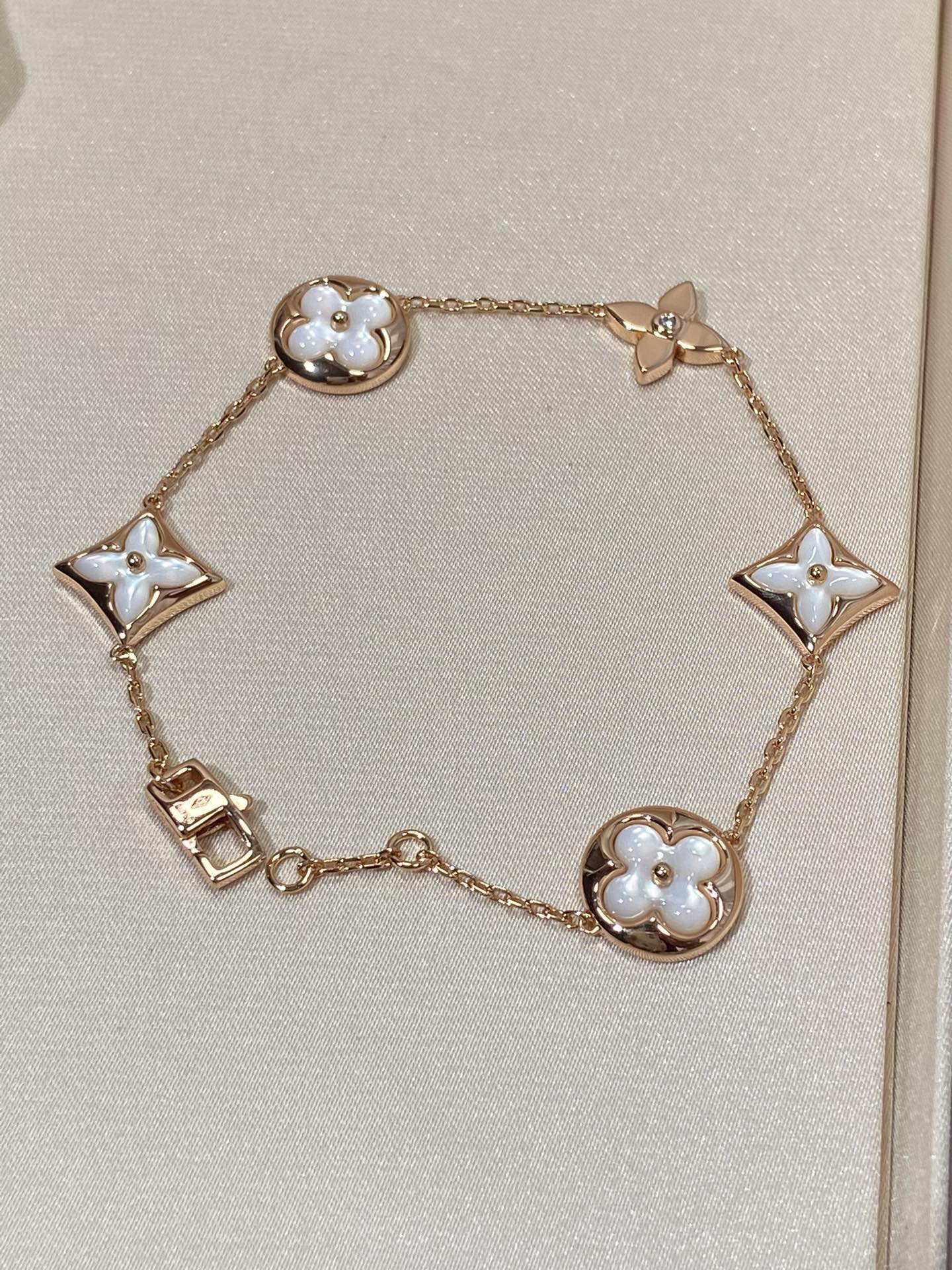[Charm Aries Jewelry]STAR AND SUN 5 MOTIF MOP PINK GOLD BRACELET