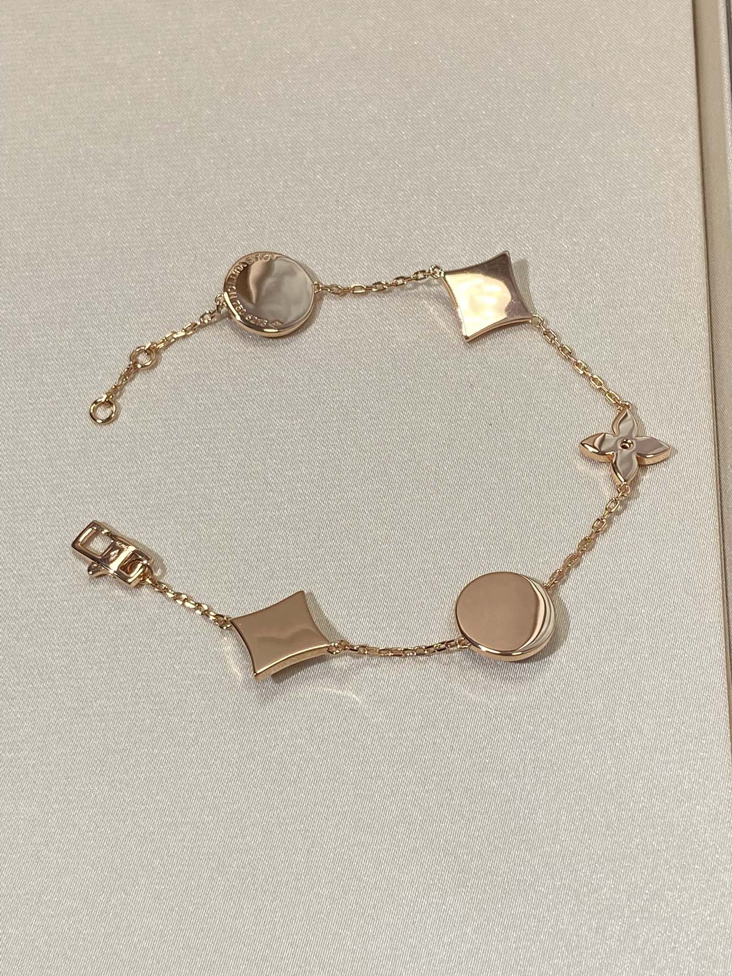 [Charm Aries Jewelry]STAR AND SUN 5 MOTIF MOP PINK GOLD BRACELET