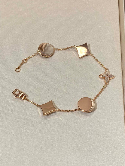 [Charm Aries Jewelry]STAR AND SUN 5 MOTIF MOP PINK GOLD BRACELET