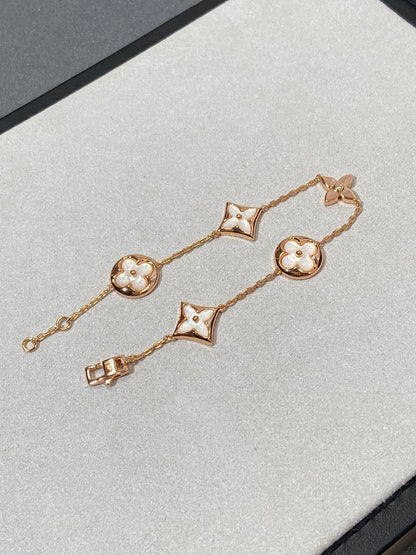 [Charm Aries Jewelry]STAR AND SUN 5 MOTIF MOP PINK GOLD BRACELET