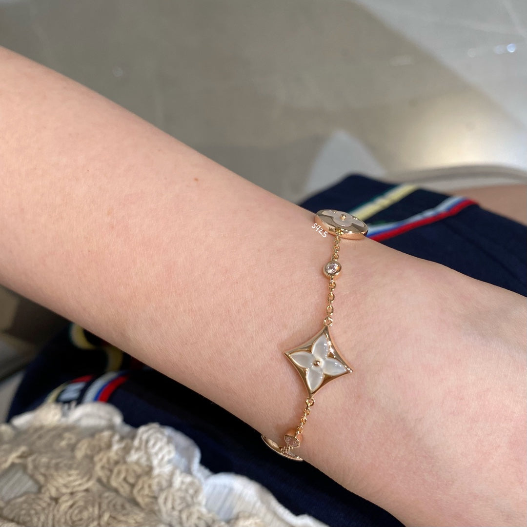 [Charm Aries Jewelry]STAR AND SUN 4 MOTIF WHITE MOP PINK GOLD BRACELET