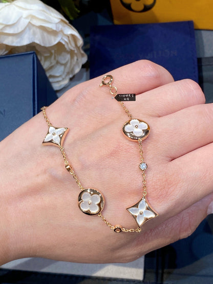 [Charm Aries Jewelry]STAR AND SUN 4 MOTIF WHITE MOP PINK GOLD BRACELET
