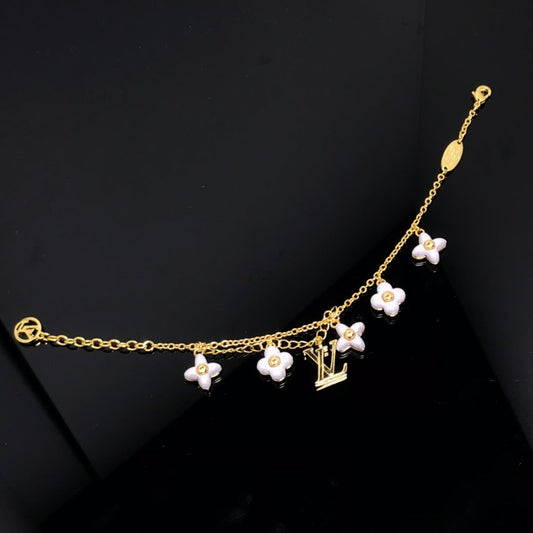 [Charm Aries Jewelry]LOGO 6 MOTIF STAR AND SUN GOLD BRACELET