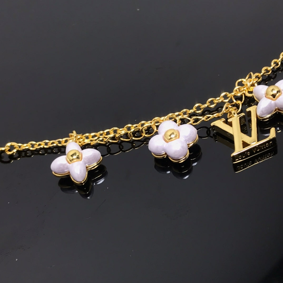 [Charm Aries Jewelry]LOGO 6 MOTIF STAR AND SUN GOLD BRACELET