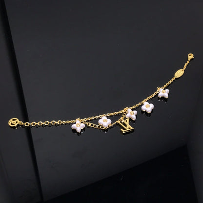 [Charm Aries Jewelry]LOGO 6 MOTIF STAR AND SUN GOLD BRACELET